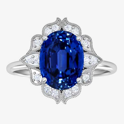 Vintage Oval Untreated Blue Sapphire Ring with Pave Set Diamond Halo