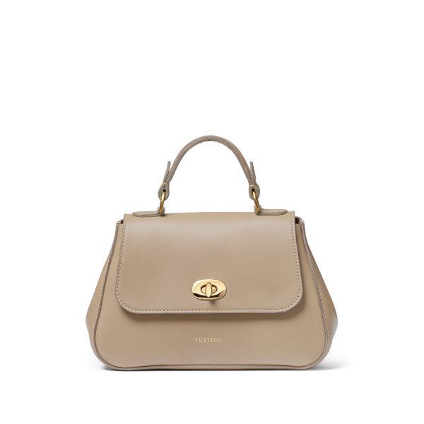 A photo of the bag. Kate carried an on-trend mini bag. She rounded out her look with the Mini Holly in Taupe Atlantic by Tusting