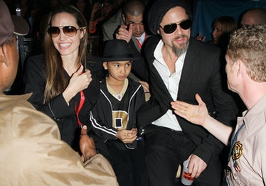 Angelina Jolie, Brad Pitt, and their son Maddox at the Super Bowl