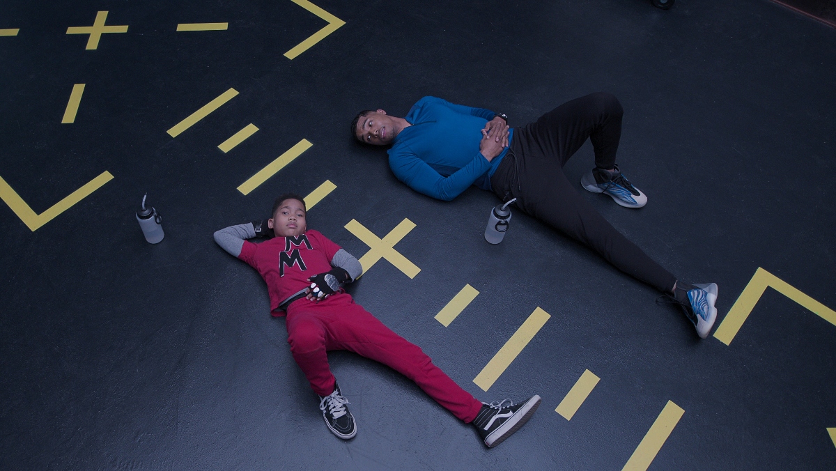raising dion season two trailer still with dion and his new friend Tevin lying on the floor