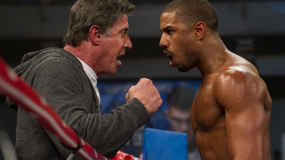 photo of michael b jordan as adonis creed facing slyvester stallone's rocky balboa