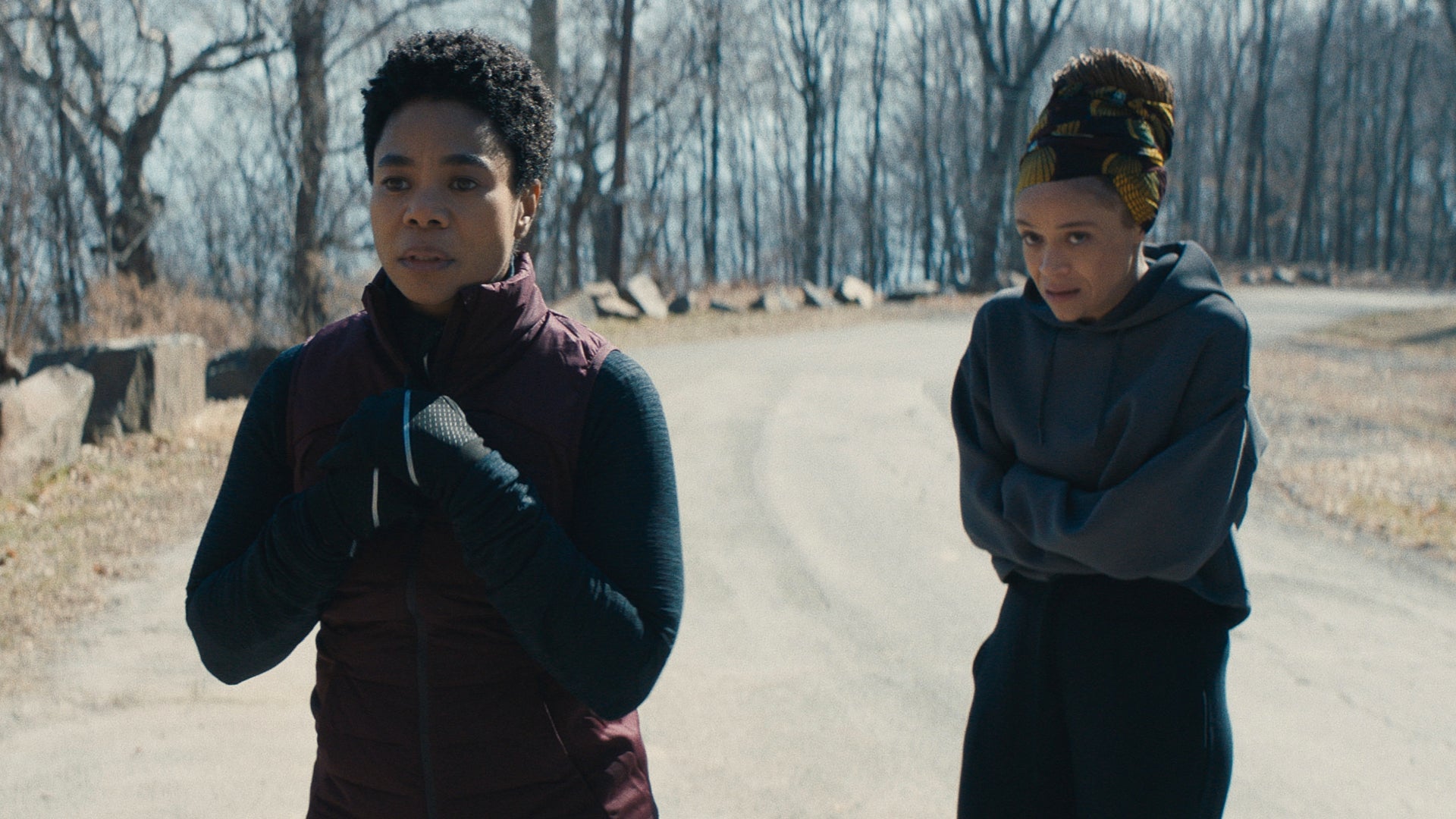 regina hall and zoe renee stand on desolate dirt path in master film black content 2022