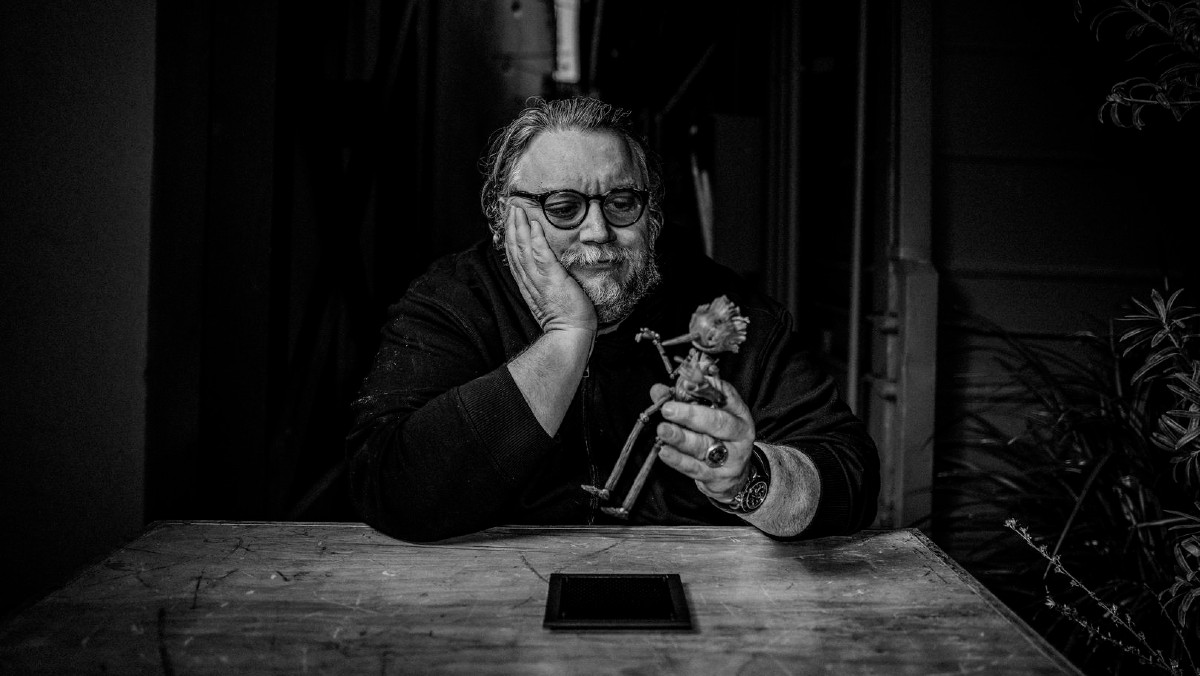 Guillermo del Toro with his puppet Pinocchio.