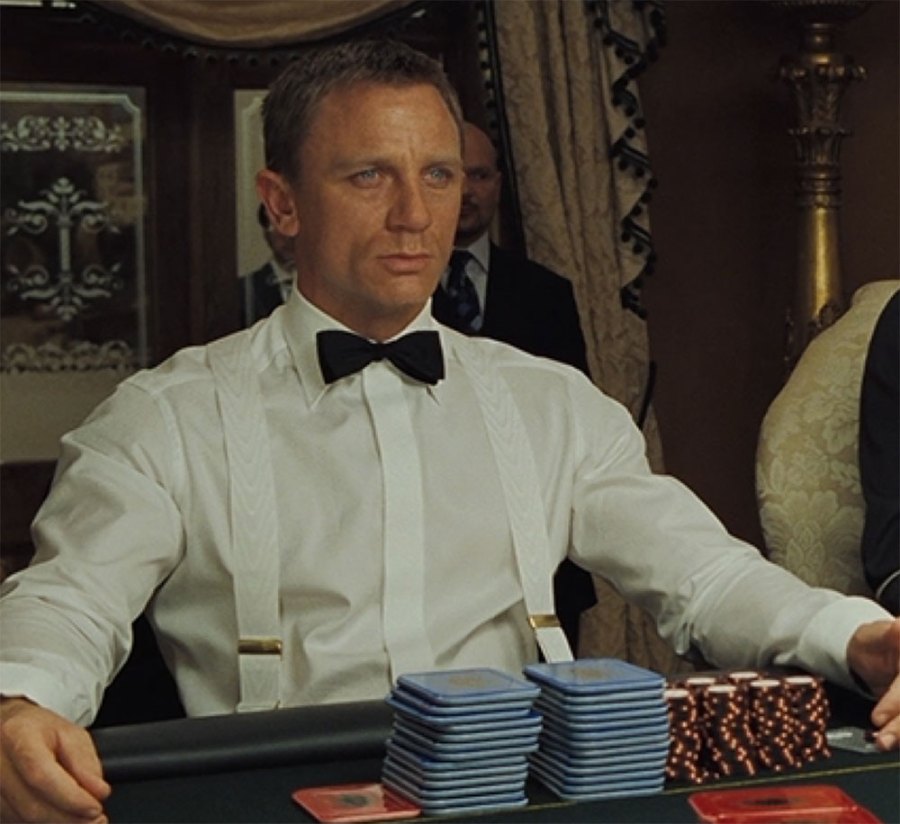Daniel Craig as James Bond in Casino Royale wearing white moire Albert Thurston suspenders with gold hardware