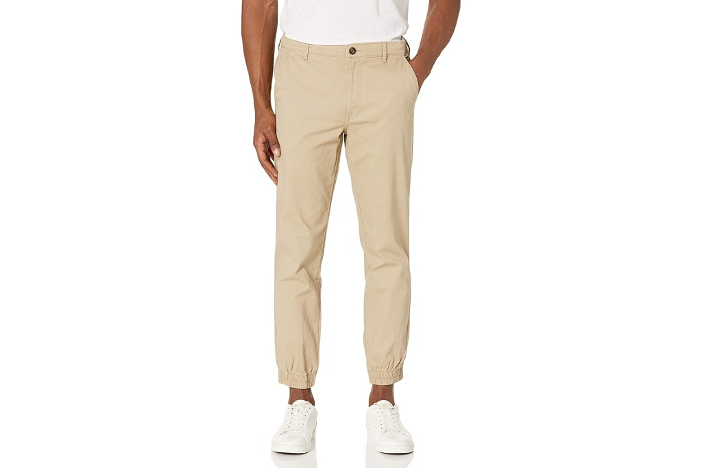 A man in a pair of beige jogger pants 