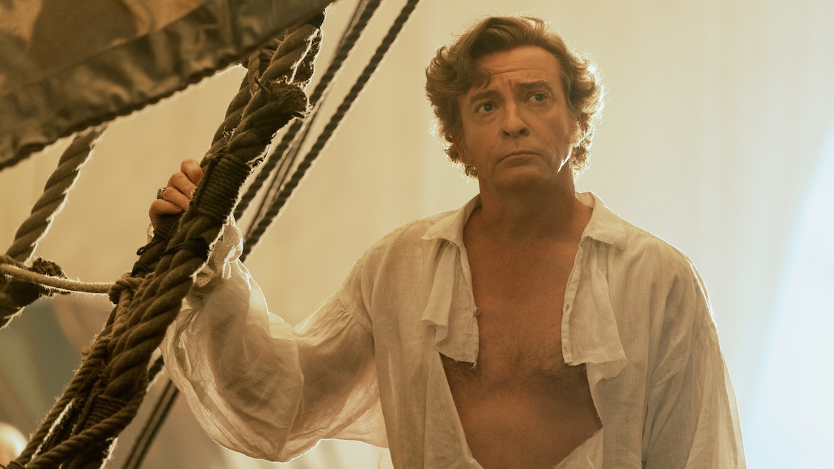 Rhys Darby with a torn shirt on Our Flag Means Death