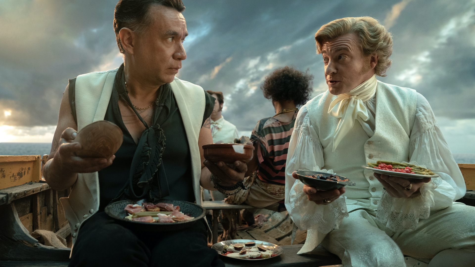 Fred Armisen and Rhys Darby share tapas on a rowboat on Our Flag Means Death