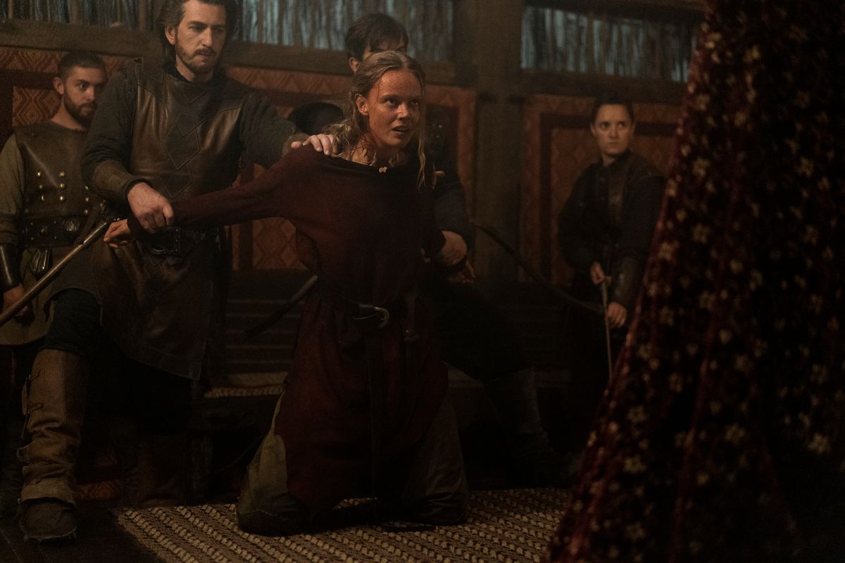 Freydis being held back by other Vikings in a still from Vikings