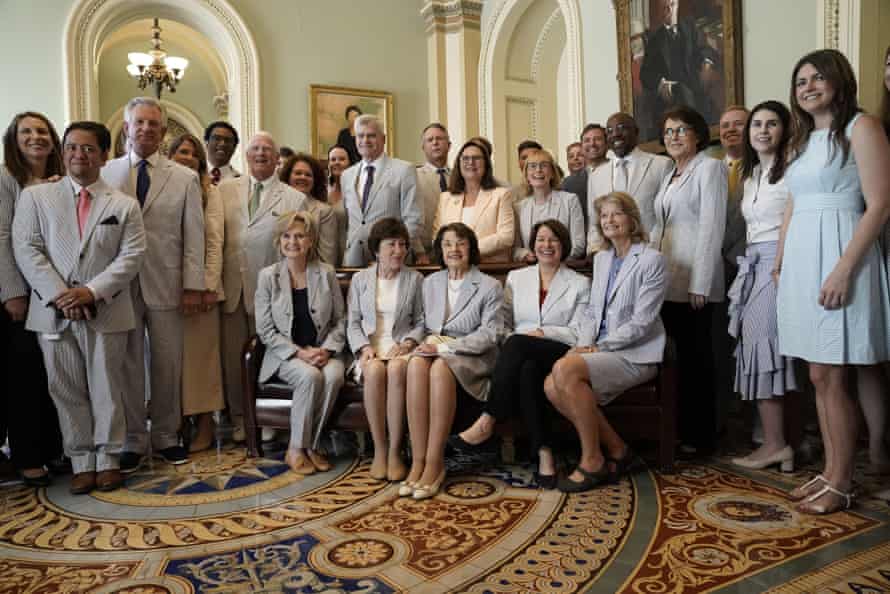 US senators and staff wearing seersucker during National Seersucker Day Event in Washington DCo n 17 Jun 2021(Seated, R to L) Sen. Lisa Murkowski, R-AK, Sen. Amy Klobuchar, D-MN, Sen. Dianne Feinstein, D-CA, Sen. Susan Collins, R-ME, and Sen. Cindy Hyde-Smith, R-MS.