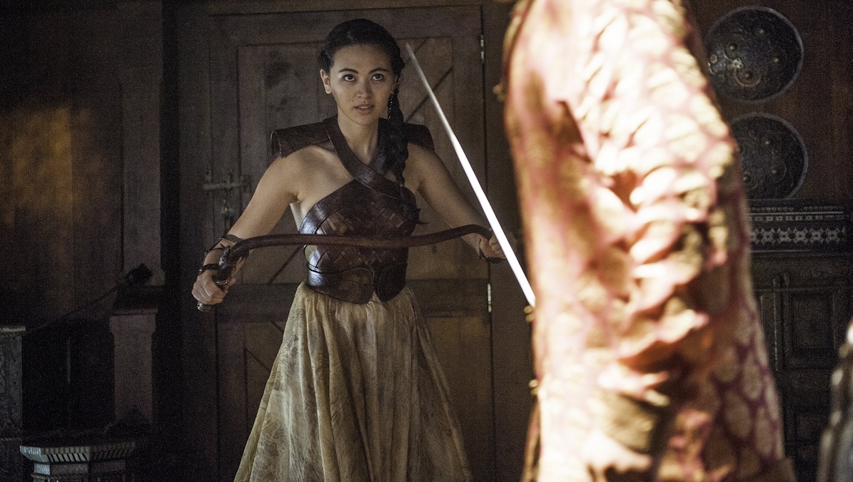 Nymeria Sands wields a bow and sword in Game of Thrones.