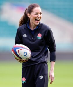 Kate Middleton holding a rugby ball