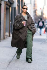 Image may contain Clothing Apparel Coat Human Person Overcoat Sunglasses Accessories Accessory and Irina Shayk