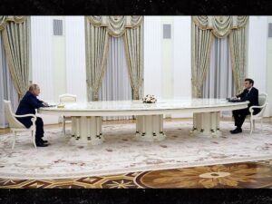 Presidents Macron and Putin Sit at Super Long Table to Talk Ukraine