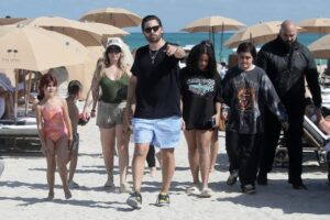 Scott Disick looks relaxed as he spends time with his 3 children on the beach in Miami
