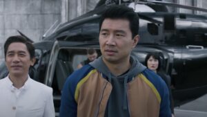 Simu Liu and others walk away from a helicopter in Marvel's Shang-Chi and the The Legend of the Ten Rings
