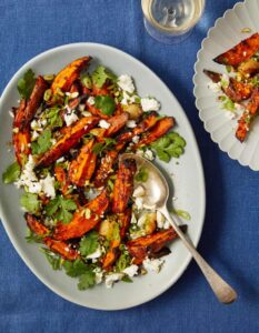 Lara Lee’s tom yum sweet potato wedges in a salad of feta, pistachios and coriander.