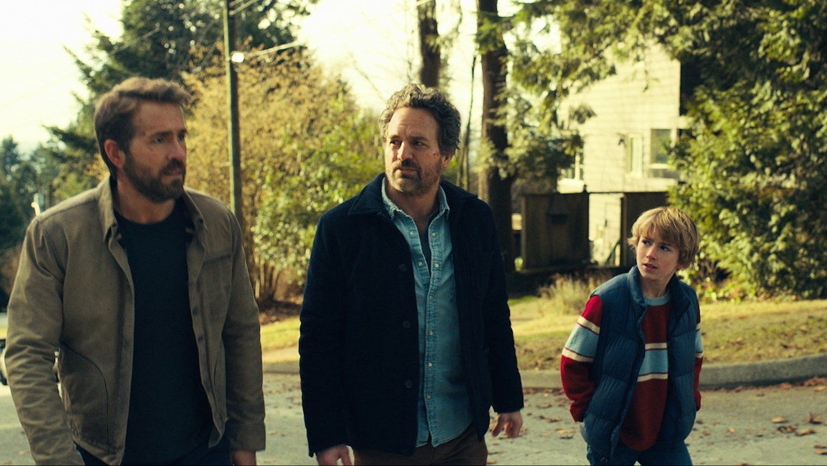 Ryan Reynolds as Big Adam, Mark Ruffalo as Louis Reed and Walker Scobell as Young Adam in The Adam Project.