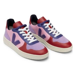 Sneakers that are a combination of red, pink, blue, and purple