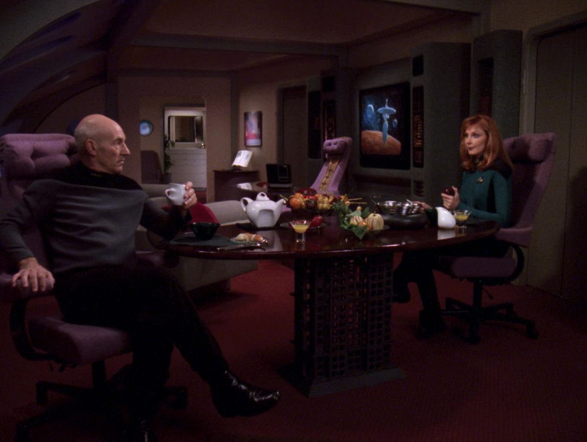 Picard enjoying tea with Dr. Crusher