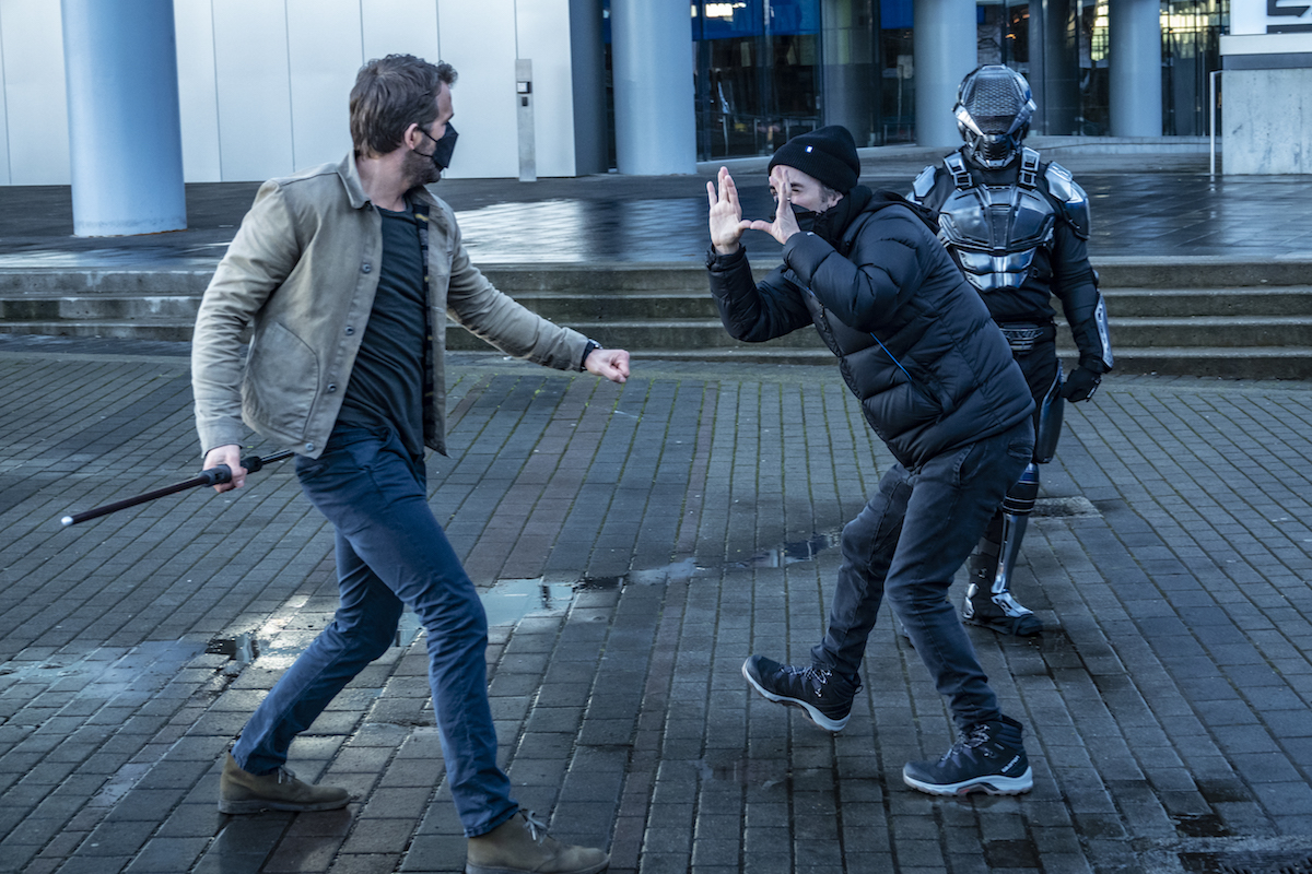 Shawn Levy directs Ryan Reynolds during an action scene of The Adam Project