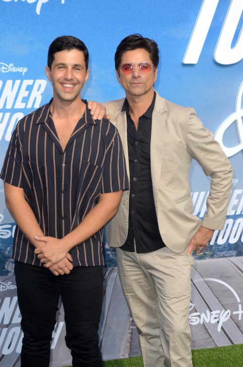 Josh Peck and John Stamos at the premiere of 