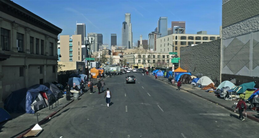 A Los Angeles street is lined with tents in "Lead Me Home." 
