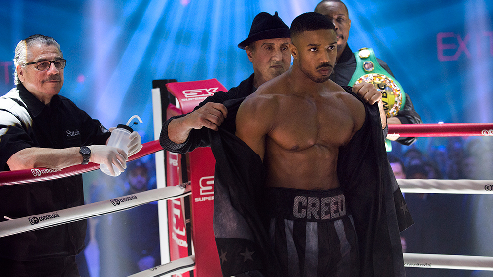 Sylvester Stallone takes off Michael B. Jordan's boxing robe in the ring