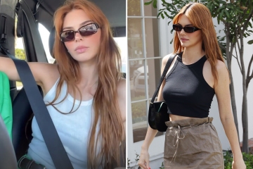 Kendall Jenner shows off plump lips & long red hair as she goes braless