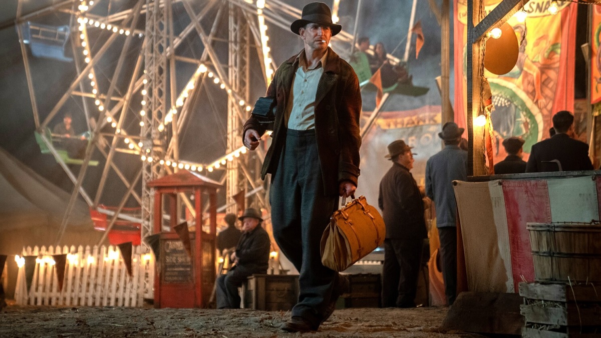 Bradley Cooper's Stanton Carlisle drifts his way into a bustling and dangerous sideshow in Guillermo del Toro's Nightmare Alley.