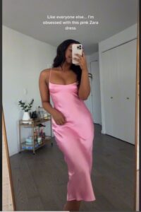 A Tik Tok user shows off her figure in the pink Zara dress