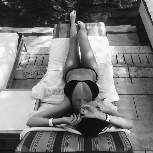 Atiana De La Hoya lounging on a sunbed.