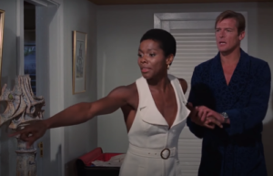 Gloria Hendry and Roger Moore in