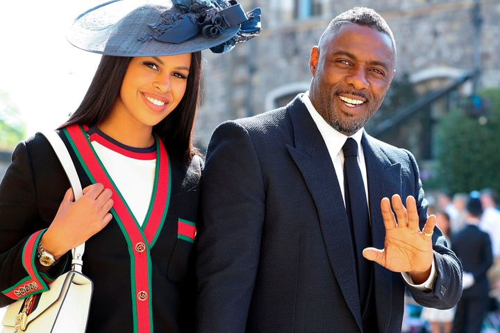 Idris Elba arrives with his then-fiancee Sabrina Dhowre for the wedding ceremony of Prince Harry and Meghan Markle at Windsor Castle. 