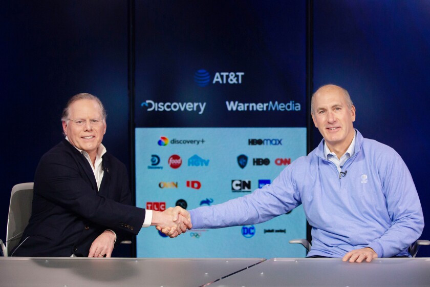 Discovery Chief Executive David Zaslav, left, and AT&T CEO John Stankey in New York City.