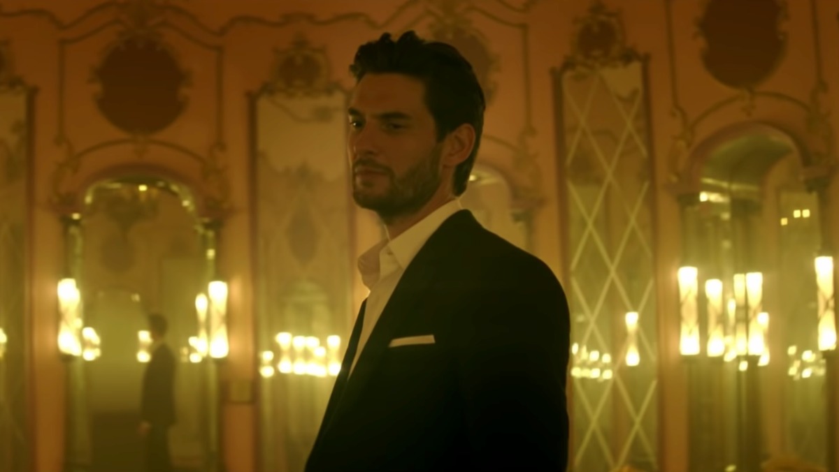 Ben Barnes in a candlelit room from his 11:11 music video