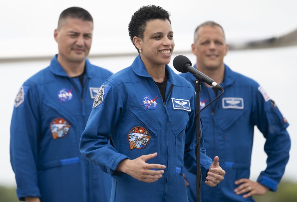 CAPE CANAVERAL, FL - APRIL 18: In this NASA handout, NASA astronaut Jessica Watkins speaks to members of the media after arriving at the Launch and Landing Facility at NASAs Kennedy Space Center with fellow crewmates NASA astronauts Robert Hines, Kjell Lindgren, and ESA (European Space Agency) astronaut Samantha Cristoforetti ahead of SpaceXs Crew-4 mission, Monday, April 18, 2022, in Florida. NASAs SpaceX Crew-4 mission is the fourth crew rotation mission of the SpaceX Crew Dragon spacecraft and Falcon 9 rocket to the International Space Station as part of the agencys Commercial Crew Program. Lindgren, Hines, Watkins, and Cristoforetti are scheduled to launch at April 23 at 5:26 a.m. EDT, from Launch Complex 39A at the Kennedy Space Center. (Photo by Joel Kowsky/NASA via Getty Images)