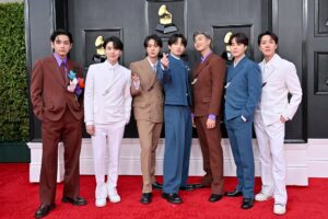 LAS VEGAS, NEVADA - APRIL 03: (L-R) V, Suga, Jin, Jungkook, RM, Jimin and J-Hope of BTS attends the 64th Annual GRAMMY Awards at MGM Grand Garden Arena on April 03, 2022 in Las Vegas, Nevada. (Photo by Axelle/Bauer-Griffin/FilmMagic)