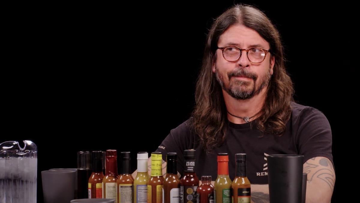 Dave Grohl as a guest on Hot Ones, he discusses how his love for UFOs gave the Foo Fighters their name and also Foo Fighters' horror comedy movie Studio 666.
