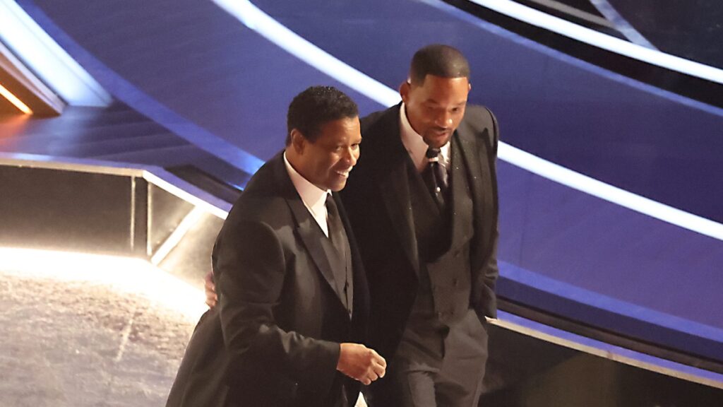 Denzel Washington Defends Will Smith: “Who Are We to Condemn?”