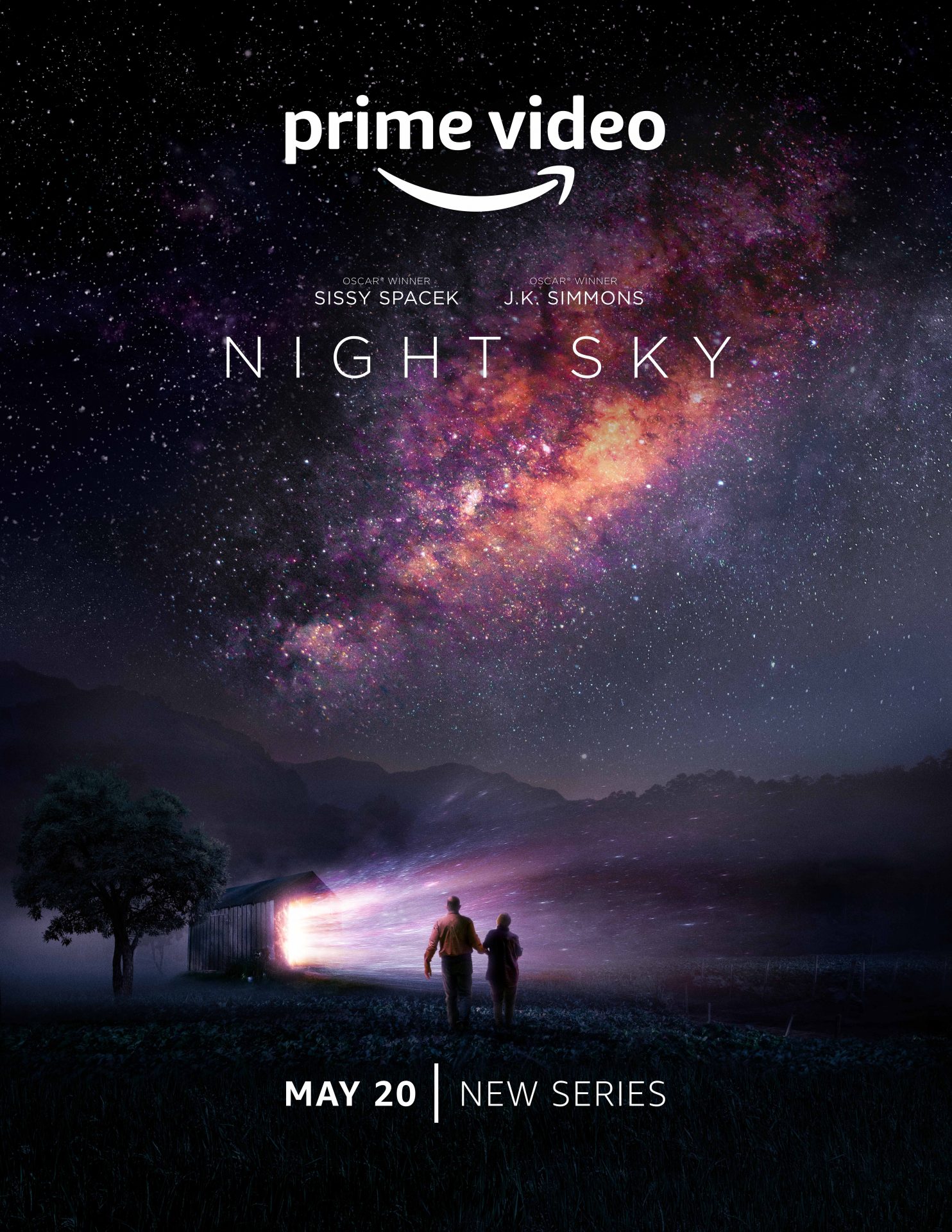 a poster for Night Sky showing Sissy Spacek and J.K. Simmons walking under a gorgeous star lit sky to a barn with shooting light coming out of it