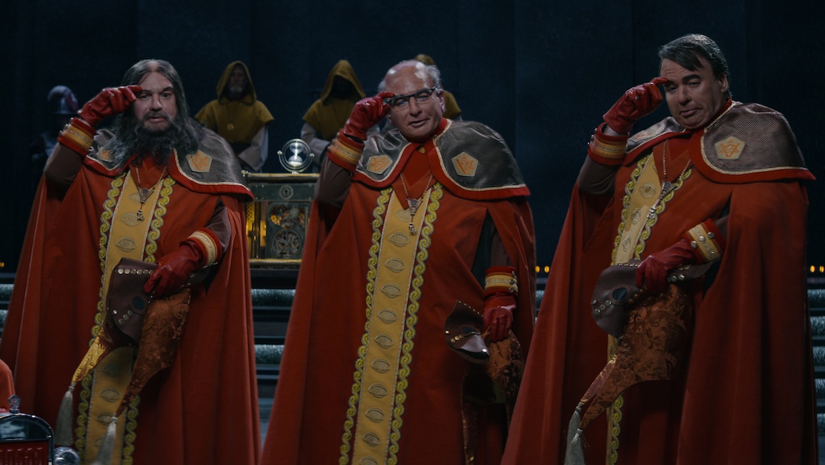 Mike Myers plays three different members of The Pentaverate in their official robes