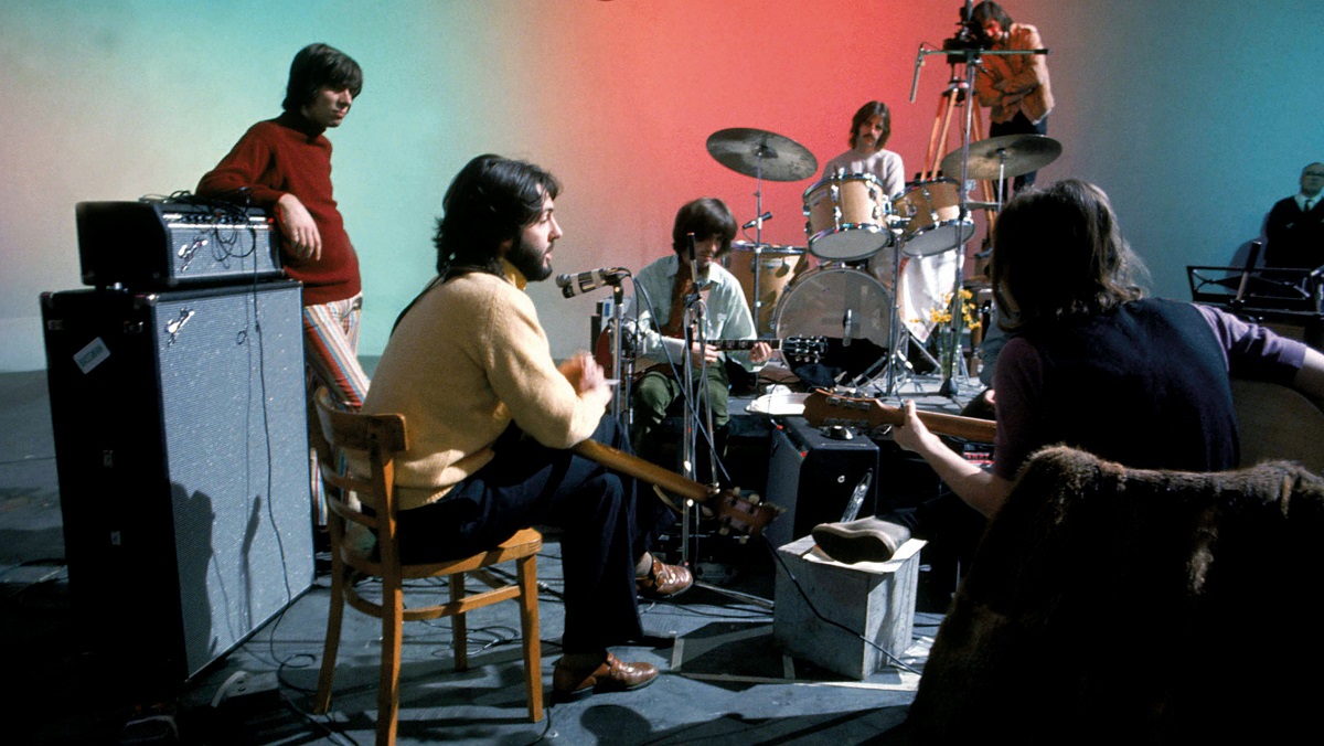 The Beatles rehearsing in 1969, as seen in the docuseries Get Back.