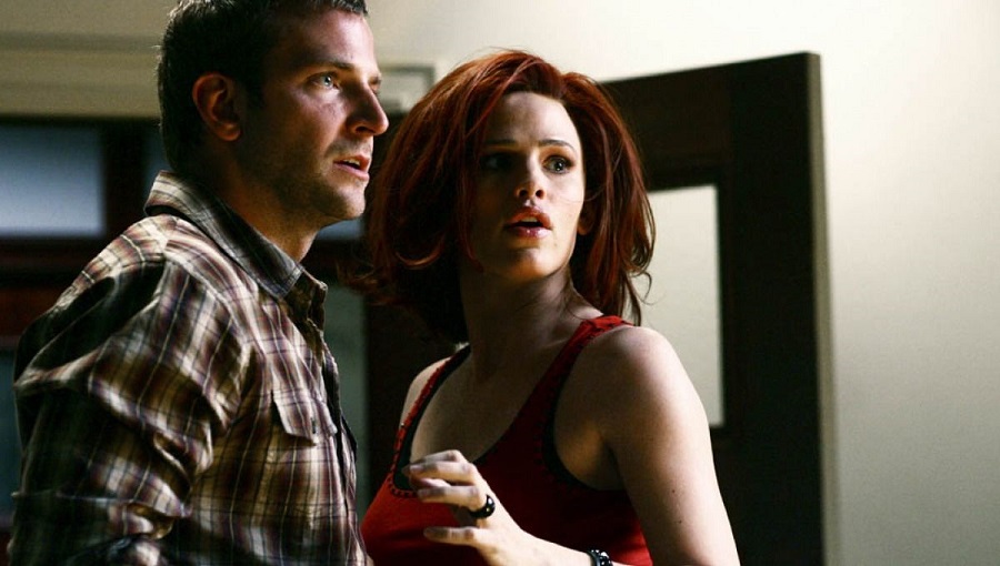 Jennifer Garner and Bradley Cooper looking shocked on Alias.