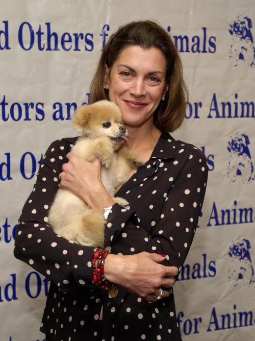 Wendie Malick holding the dog Mr. Winkle at Actors and Others for Animals 8th Annual Celebrity Fashion Show in 2000