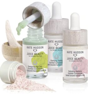 Kate Hudson Jucie Beauty Revitalizing Coktail Concentrates serum bottles.