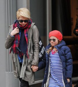 Michelle Williams and her daughter, Matilda Ledger, walking together in 2013.