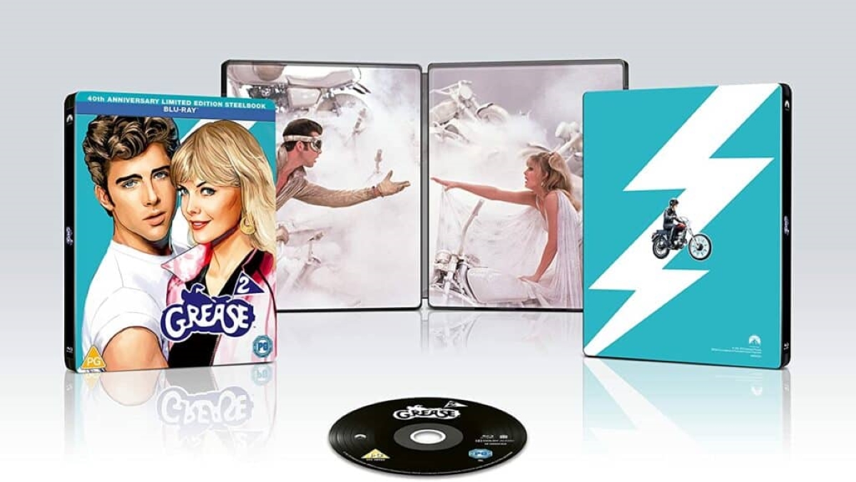Cover art for Grease 2's blu-ray showing Maxwell Caulfield and Michelle Pfeiffer