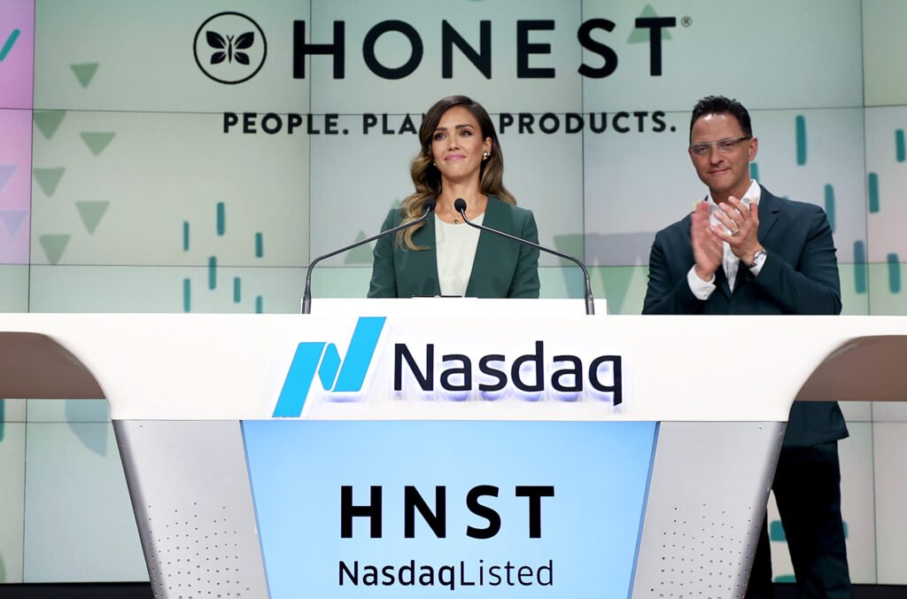 The Honest Company founder and chief creative officer Jessica Alba and The Honest Company CEO Nick Vlahos ring the Nasdaq Stock Market opening bell to mark the company