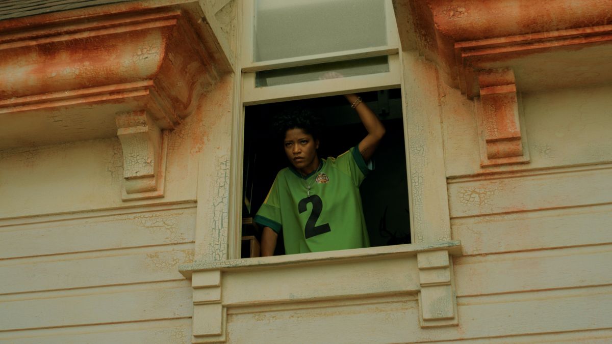 Keke Palmer looks out a window in Nope