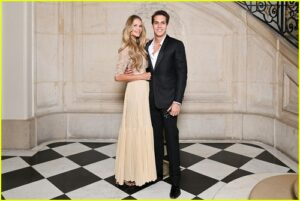 Elle Macpherson and son Flynn Busson at the Dior Show in Paris